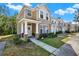 Attractive townhome with a well-manicured lawn, a covered porch, and a welcoming facade at 11041 Black Swan Ct, Seffner, FL 33584