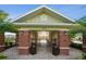 The community pool gate leads to the pool and cabana at 11548 Crowned Sparrow Ln, Tampa, FL 33626