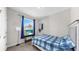Comfortable bedroom with carpet, a bed, and a window with curtains for natural light at 11625 Tetrafin Dr, Riverview, FL 33579