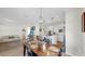 Open-concept dining room flowing into the kitchen and living room, perfect for modern living and entertaining at 11625 Tetrafin Dr, Riverview, FL 33579