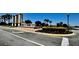 Community entrance sign with manicured landscaping and water feature at 11625 Tetrafin Dr, Riverview, FL 33579