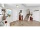 Inviting foyer with attractive tile flooring, staircase, and tasteful decor at 11625 Tetrafin Dr, Riverview, FL 33579