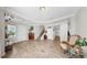 Spacious foyer with tile floors, a staircase, and decorative accents creates a welcoming entrance at 11625 Tetrafin Dr, Riverview, FL 33579
