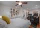 Bright and spacious bedroom with a modern ceiling fan and an adjacent living space or office area at 121 W Mohawk Ave, Tampa, FL 33604