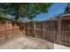 Wooden driveway gate providing access to the property at 121 W Mohawk Ave, Tampa, FL 33604
