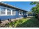 Charming home featuring updated siding, ample green space, and a well maintained lawn at 121 W Mohawk Ave, Tampa, FL 33604