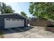 A detached garage provides ample parking and storage space, enhancing the functionality of this residence at 121 W Mohawk Ave, Tampa, FL 33604