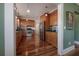 Well-lit kitchen boasts granite countertops, stainless steel appliances, and hardwood floors, ready for cooking at 121 W Mohawk Ave, Tampa, FL 33604