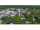 Overhead view of Brooksville with water tower, lush greenery, and local architecture, conveying a sense of community at 131 Oak Park Ave, Brooksville, FL 34601