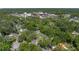 Aerial view of property nestled among lush greenery in a vibrant community at 131 Oak Park Ave, Brooksville, FL 34601
