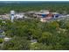 Areal view of the property nestled among lush greenery in a vibrant community at 131 Oak Park Ave, Brooksville, FL 34601