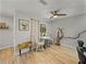 Bright dining area with round table, decorative driftwood, and wood-look flooring at 131 Oak Park Ave, Brooksville, FL 34601