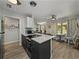 Open concept with view to the connected kitchen, dining, and living area at 131 Oak Park Ave, Brooksville, FL 34601
