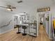 Open floor plan showing bar seating overlooking the kitchen and connecting hallway at 131 Oak Park Ave, Brooksville, FL 34601
