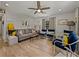 Bright living room with hardwood floors, modern furniture, and natural light at 131 Oak Park Ave, Brooksville, FL 34601