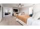 Cozy main bedroom with a large bed and seating area at 14623 Horse Trot Rd, Lithia, FL 33547
