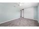 Bedroom with new carpet, closet and fresh paint at 15034 Newport Rd, Clearwater, FL 33764