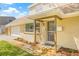 Charming home showcasing a well-manicured lawn and front porch, plus a spacious two-car garage at 15034 Newport Rd, Clearwater, FL 33764