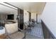 Spacious balcony with comfortable seating and views of the ocean, perfect for relaxing and entertaining at 1581 Gulf Blvd # 301N, Clearwater Beach, FL 33767