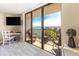 Balcony area offering peaceful water views and comfortable seating to relax and enjoy at 1581 Gulf Blvd # 301N, Clearwater Beach, FL 33767