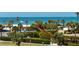Beach access with tennis court and palms in gated community at 1581 Gulf Blvd # 301N, Clearwater Beach, FL 33767