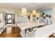 Bright dining room with stylish white furnishings and beach-themed decor, creating a coastal ambiance at 1581 Gulf Blvd # 301N, Clearwater Beach, FL 33767