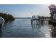Beautiful waterfront view with docks and boats on a sunny day at 1581 Gulf Blvd # 301N, Clearwater Beach, FL 33767