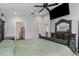 Large main bedroom features recessed lights and access to the main bathroom at 18836 Maisons Dr, Lutz, FL 33558