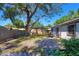 Enclosed backyard with a patio, gardening beds and ample space for outdoor enjoyment at 1915 Peppertree Dr, Oldsmar, FL 34677
