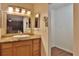 Bathroom featuring a vanity, granite countertops and decorative lighting at 1915 Peppertree Dr, Oldsmar, FL 34677