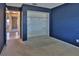 Bedroom featuring open closet and view to hall at 1915 Peppertree Dr, Oldsmar, FL 34677