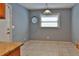 Bright and airy eat-in kitchen area with tile flooring and a window with natural light at 1915 Peppertree Dr, Oldsmar, FL 34677