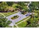 Gated community entrance with manicured landscaping and decorative signage at 19194 Lake Audubon Dr, Tampa, FL 33647