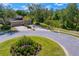 Attractive townhome with a double garage, circular driveway, and picturesque landscaping at 19194 Lake Audubon Dr, Tampa, FL 33647