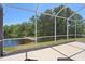 Enjoy the tranquil view from this screened in lanai with a pond view at 19194 Lake Audubon Dr, Tampa, FL 33647