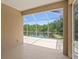 Covered and screened lanai overlooking the serene pond at 19194 Lake Audubon Dr, Tampa, FL 33647