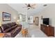 Expansive living room with tile floors, and an open floor plan perfect for modern living at 19194 Lake Audubon Dr, Tampa, FL 33647