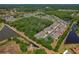 Aerial view of the property's location in a well-maintained residential community with pond views at 20117 Indian Rosewood Dr, Tampa, FL 33647