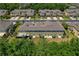 Aerial view of a two-story home in a residential community featuring well-maintained landscaping at 20117 Indian Rosewood Dr, Tampa, FL 33647