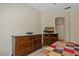 Bedroom with dressers, TV, and comfortable bedding at 20117 Indian Rosewood Dr, Tampa, FL 33647