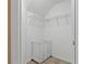A well-organized closet features wire shelving and ample storage space for laundry needs at 20117 Indian Rosewood Dr, Tampa, FL 33647