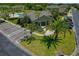 Aerial view of clubhouse with a pool and parking area at 20117 Indian Rosewood Dr, Tampa, FL 33647