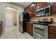 Well-equipped kitchen with stainless steel appliances, granite countertops, and ample cabinet space at 20117 Indian Rosewood Dr, Tampa, FL 33647