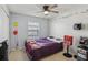 Inviting bedroom with a cozy bed and whimsical decorations on the wall at 2050 28Th N Ave, St Petersburg, FL 33713