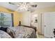 Comfortable main bedroom with a king size bed and ensuite bathroom with updated features at 2050 28Th N Ave, St Petersburg, FL 33713