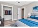 Cozy bedroom featuring a closet, ceiling fan, and modern decor at 2054 Deerwood Rd, Seffner, FL 33584