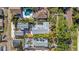 This home has an oversized garage, an garage apartment, and a pool surrounded by lush tropical landscaping at 220 19Th S Ave, St Petersburg, FL 33705