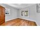 Empty bedroom with hardwood floors, white walls, and a double window at 220 19Th S Ave, St Petersburg, FL 33705