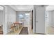 Dining area with a small table, seating for two, tile floors, and natural light at 220 19Th S Ave, St Petersburg, FL 33705