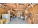 Spacious open garage with storage space and visible rafter beams at 220 19Th S Ave, St Petersburg, FL 33705
